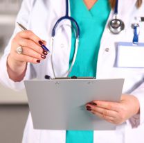 <p>Portrait of happy medical doctor woman in office.</p>
