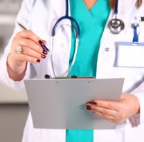 <p>Portrait of happy medical doctor woman in office.</p>
